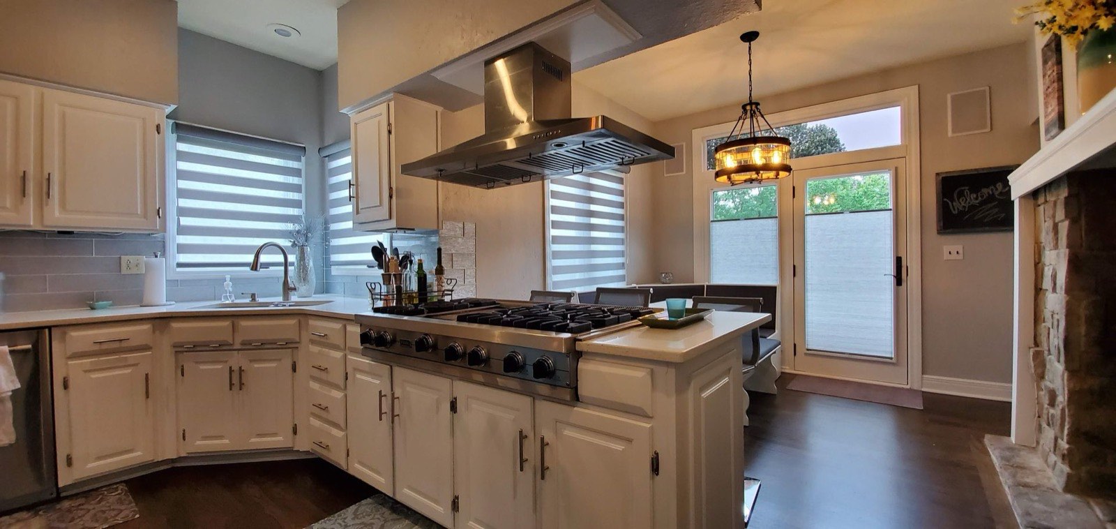 Banded shades on kitchen windows